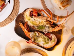 Gourmet lobster meal served onboard Lagoon 40 catamaran in San Blas