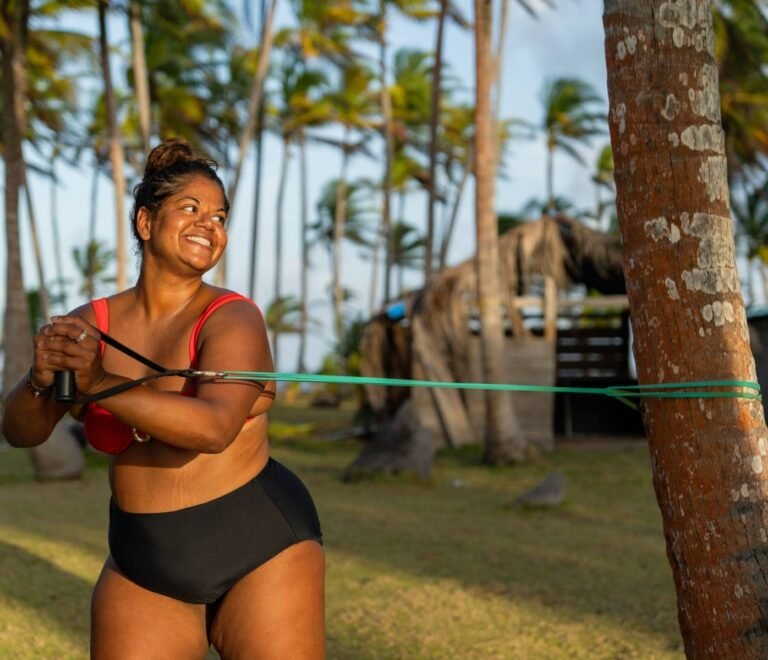 Resistance training session on beach during San Blas wellness retreat