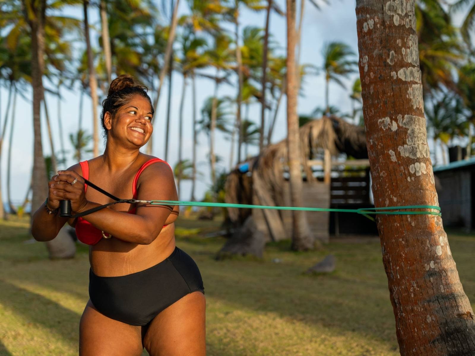 Resistance training session on beach during San Blas wellness retreat