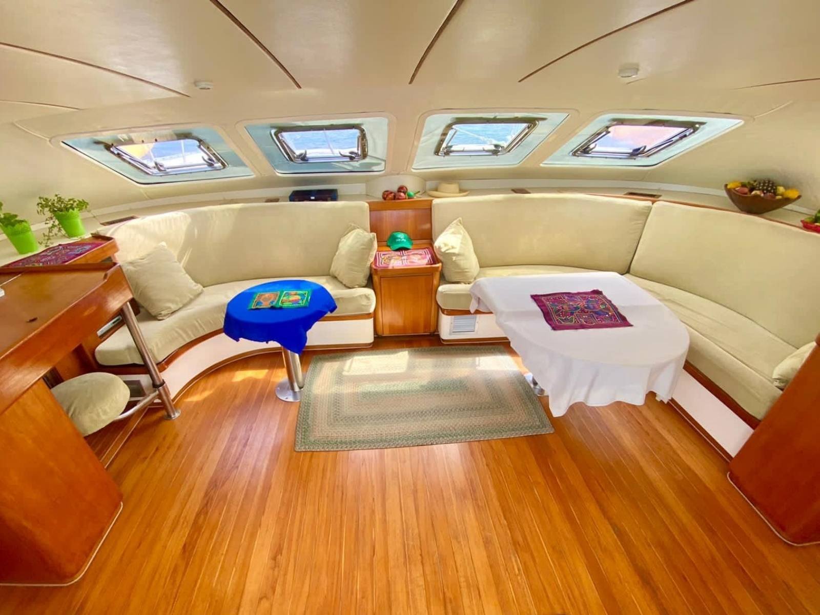 Interior salon inside Lagoon 55 catamaran in San Blas with panoramic windows