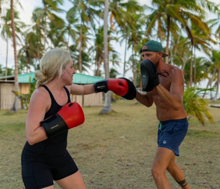 Boxing fitness session during catamaran wellness retreat in San Blas